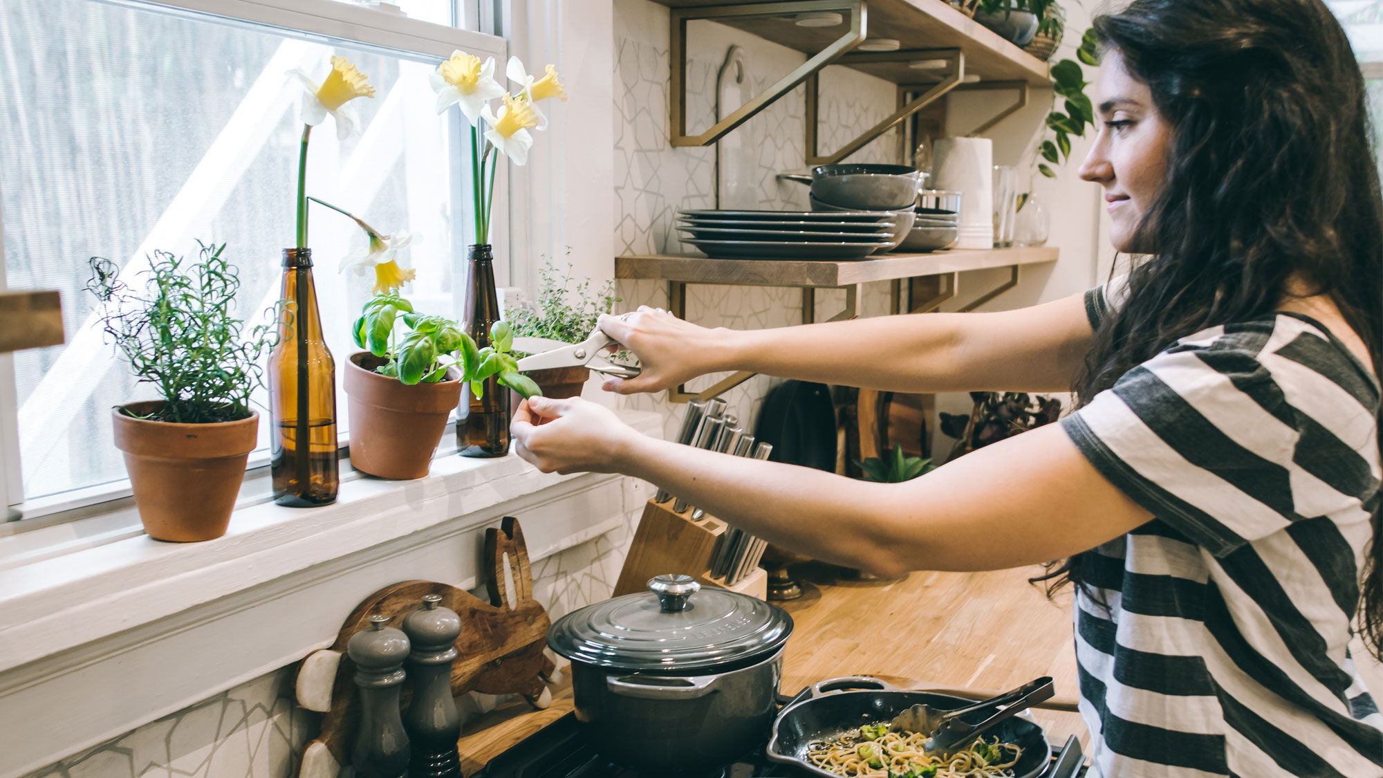 woman trimming plants